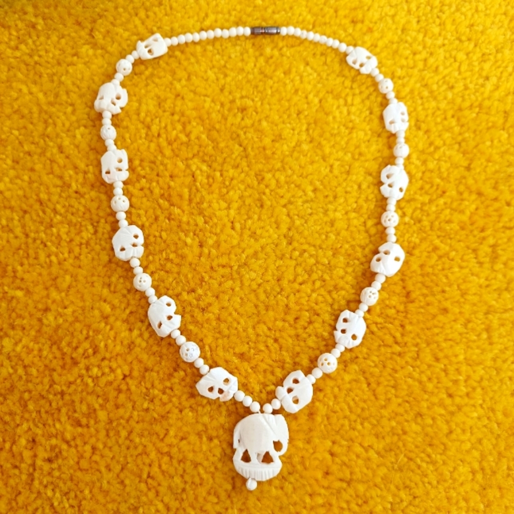 Vintage genuine bone elephant necklace hand carved